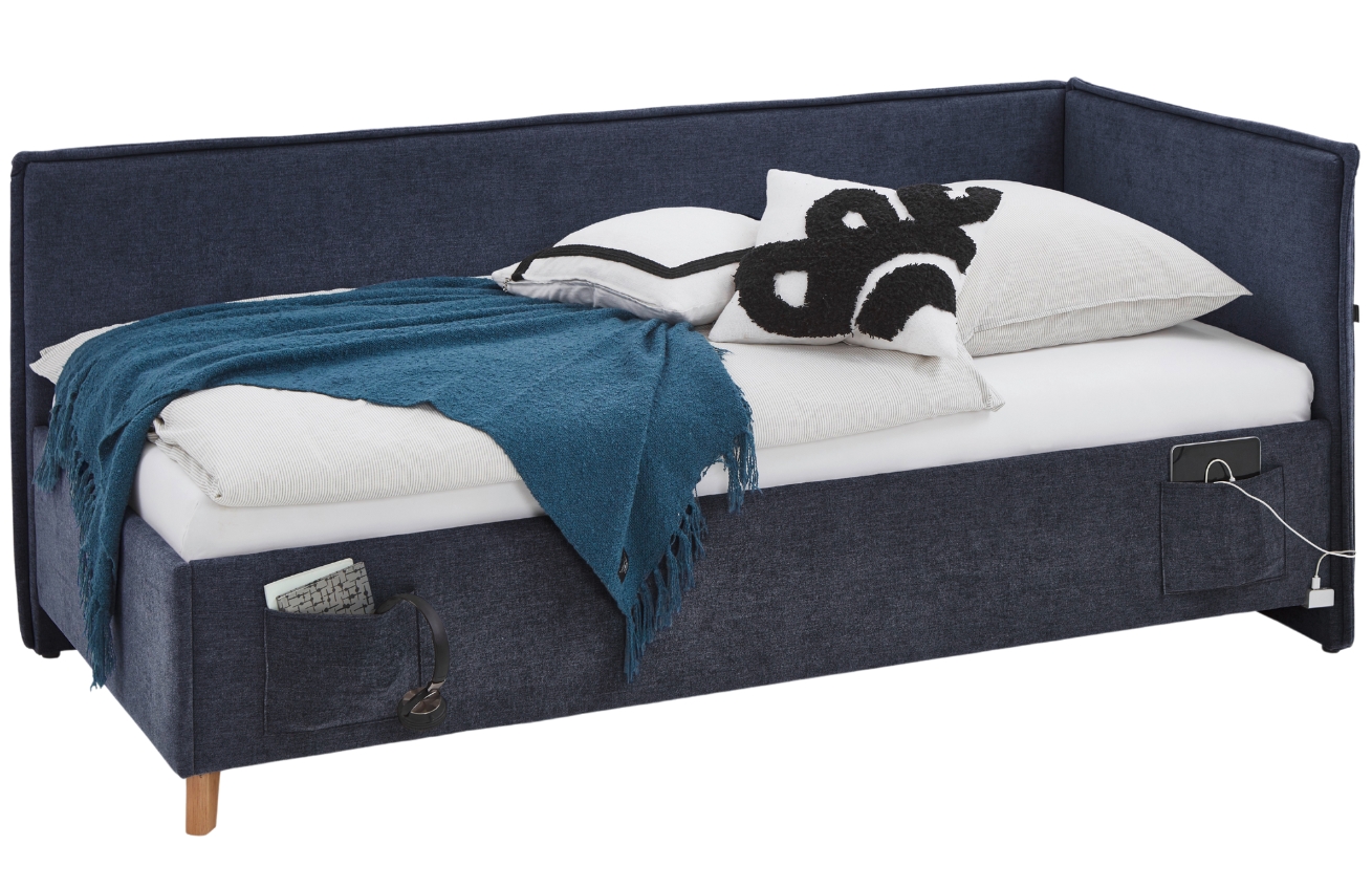 Modrá čalouněná postel Meise Möbel Fun II. 120 x 200 cm s úložným prostorem